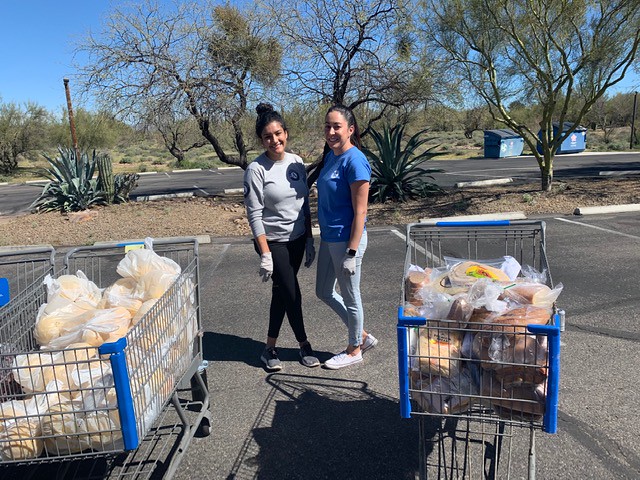 AmeriCorps members serving at a local food bank 