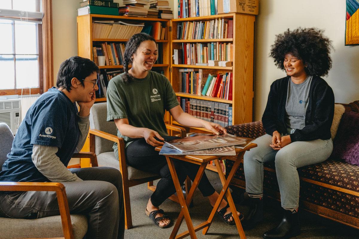 AmeriCorps VISTA members around a table