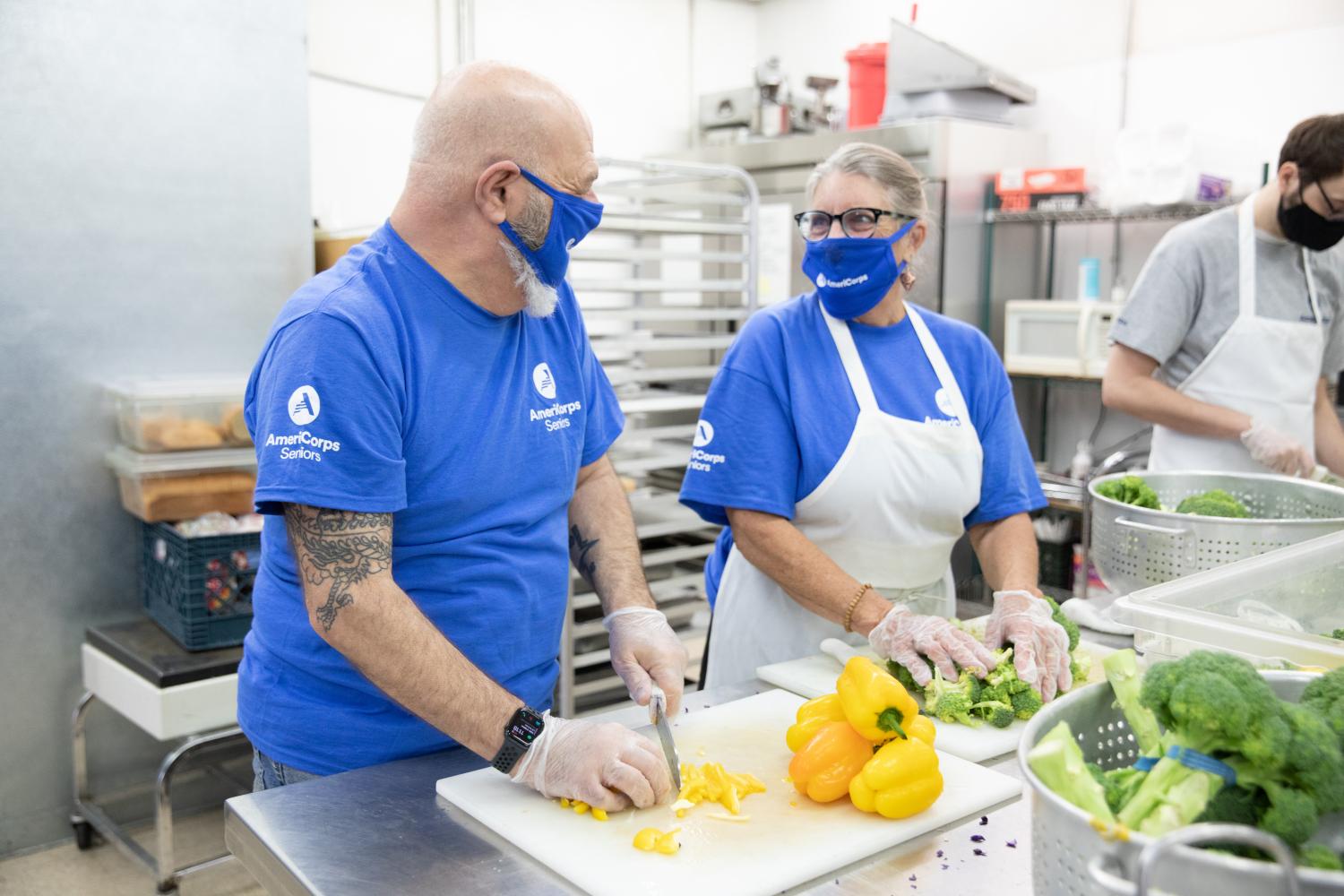 AmeriCorps Senior volunteers cooking 