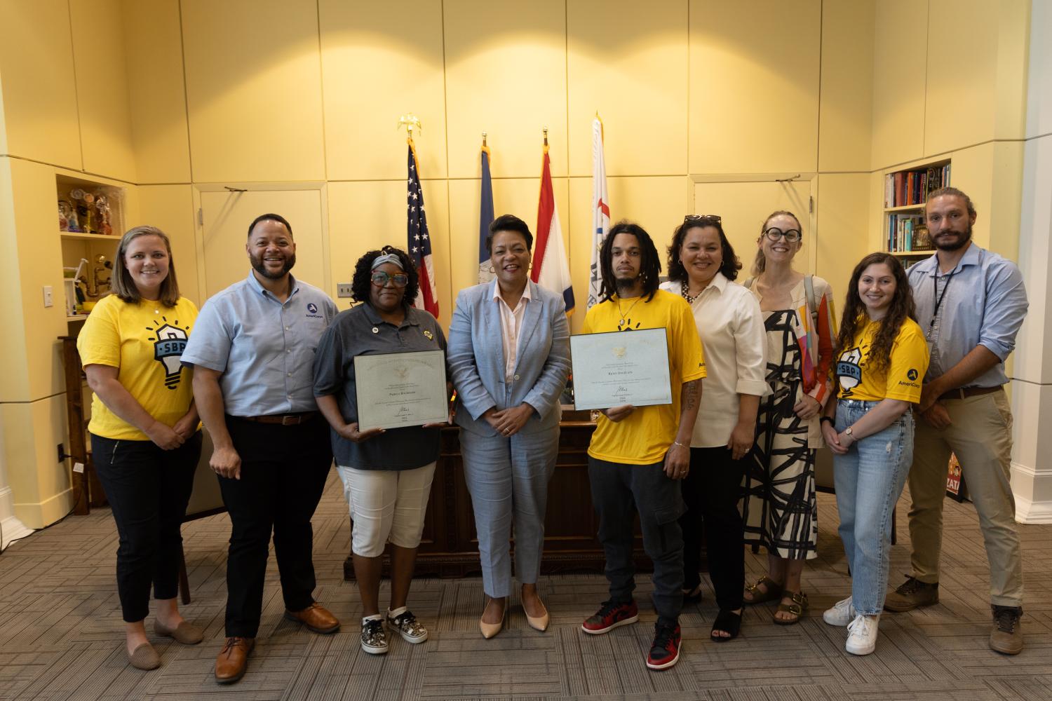 AmeriCorps CEO with Mayor and members