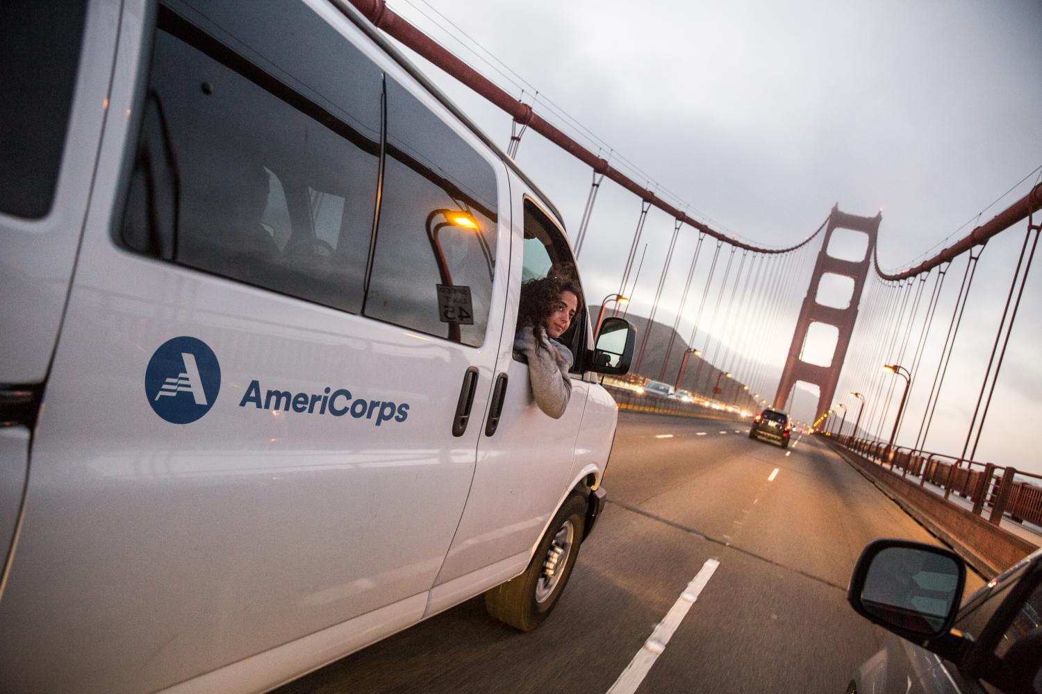 AmeriCorps NCCC member riding in a van