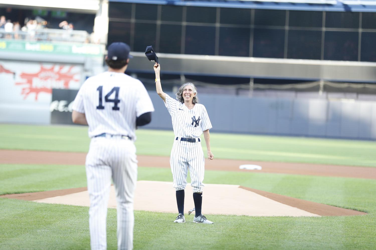 Gwen Goldman hat tip after the first pitch