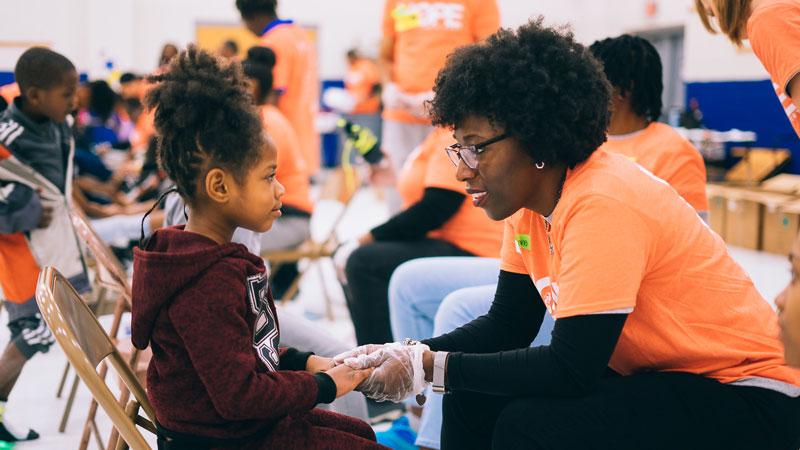 An AmeriCorps member serving in public health