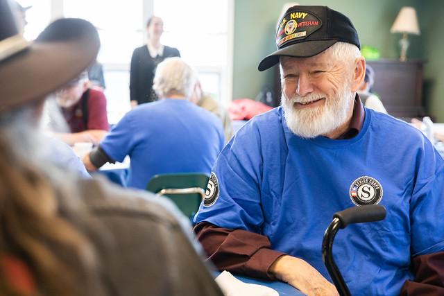 RSVP volunteer smiling at celebratory event